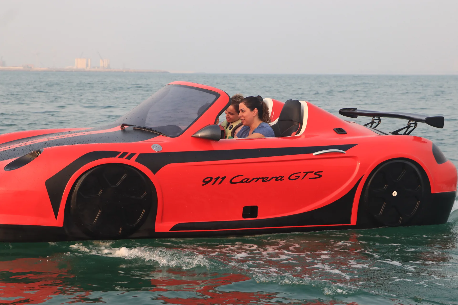 Red 911 Carrera style Super Water Car on water