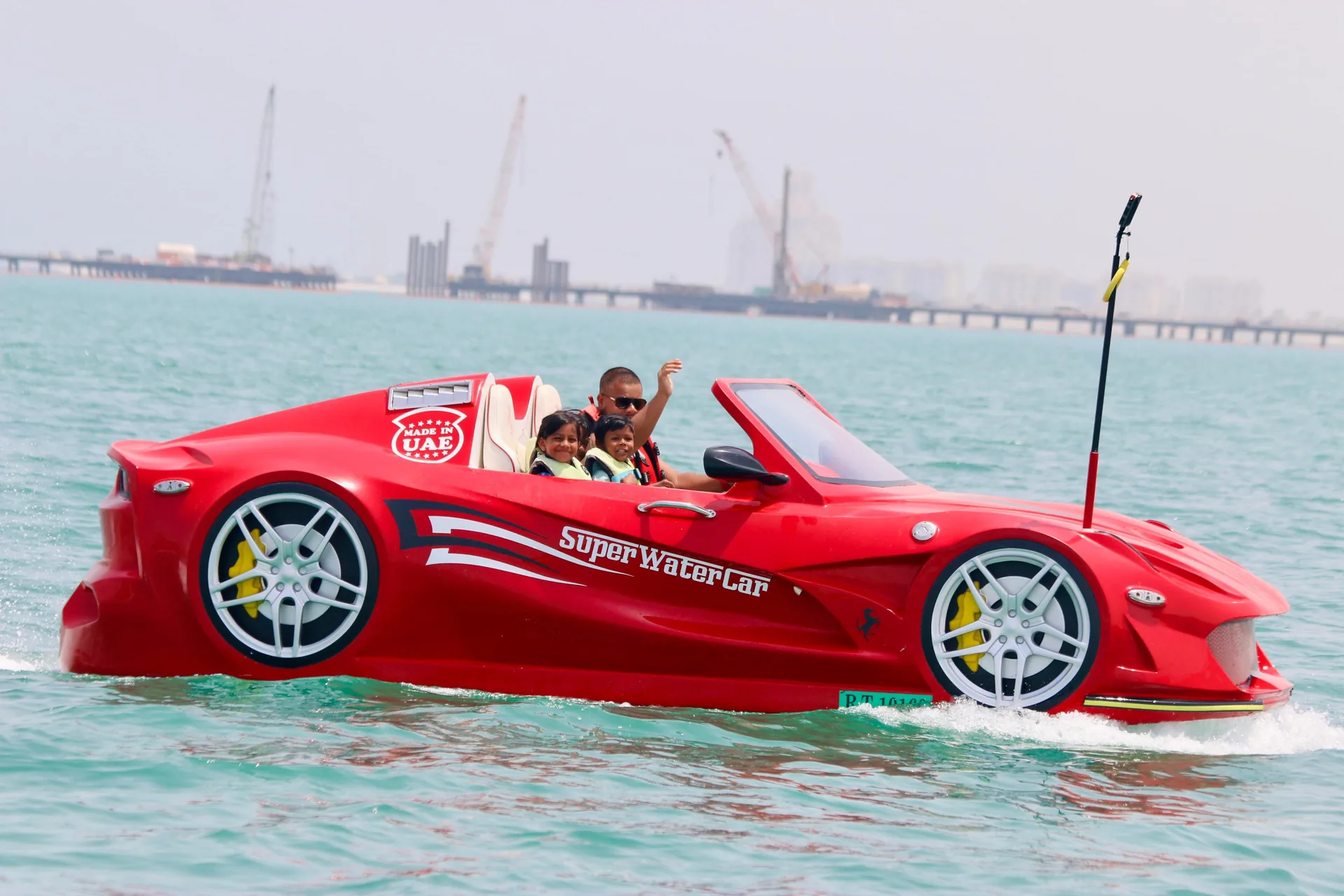 Red Super Water Car with family riders